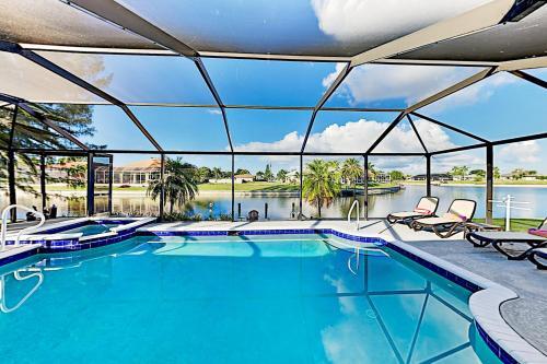 Waterfront Oasis - Private Caged Pool, Spa & Dock Home