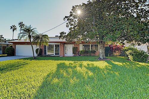 New Listing! Canal-front Escape With Private Yard Home