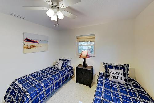New Listing! Canal-front Escape With Private Yard Home