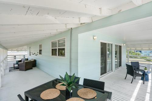 Blue Oasis, Canal Front Home With Dock, Fire Pit, Porches And Walk To Beach