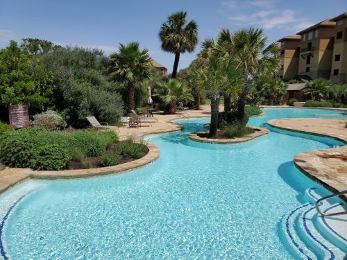 Waterfront Condo W/shared Pool Next To Hsb Resort