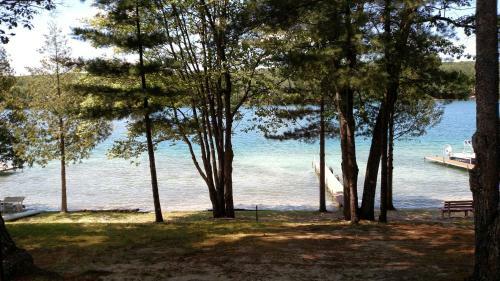 Log Cottage On Blue Lake