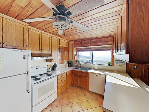 New Listing! Pelican Harbor: Beachfront Treasure Home