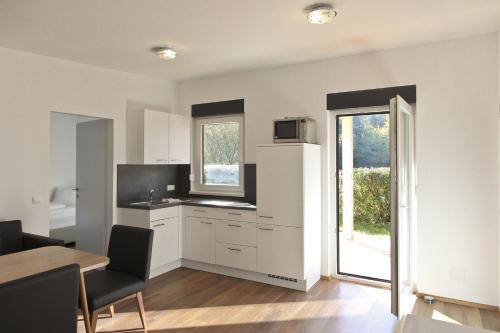Hostal Gasthof Pension Wei�es R�ssl