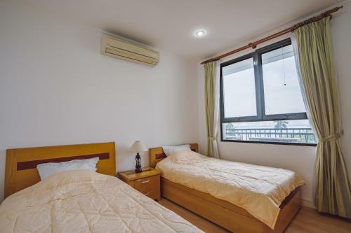 Coco Flower Village Serviced Apartment
