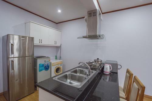 Coco Flower Village Serviced Apartment