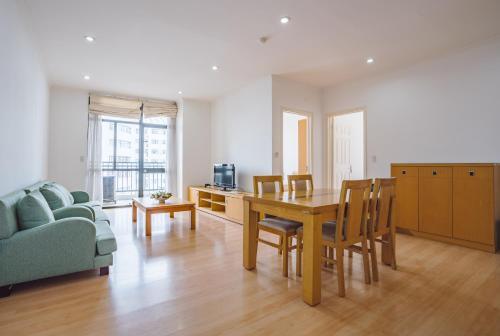 Coco Flower Village Serviced Apartment