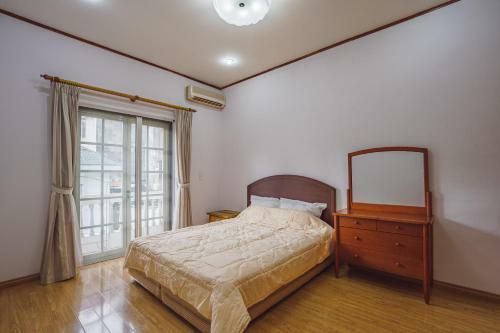 Coco Flower Village Serviced Apartment