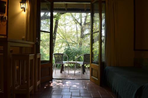 Posada Manantial Hoster�a & Caba�as