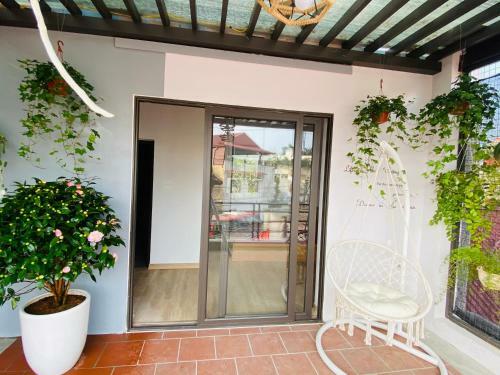 Apartamento Camellia's Home / Nh� Tr�