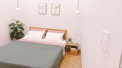 Apartamento Camellia's Home / Nh� Tr�