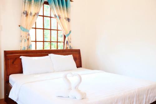 Hostal The Palm Tree Guesthouse
