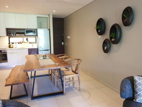 Apartamento Zimbali Suites 115
