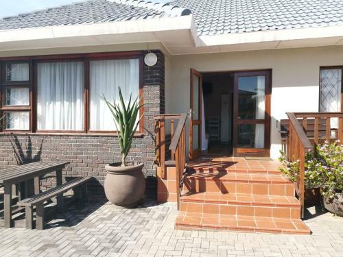 Apartamento Pollok Beach Guest Lodge