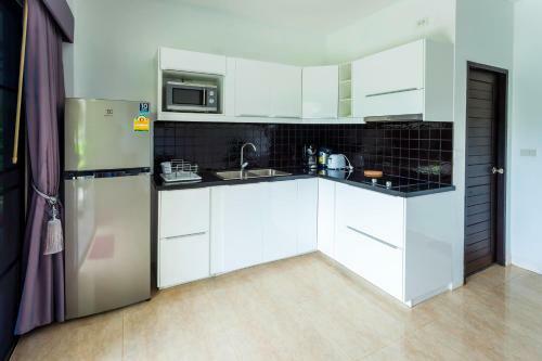Apartamento White Flower Lanta