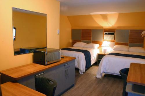 Motel Des Pentes Et Suites