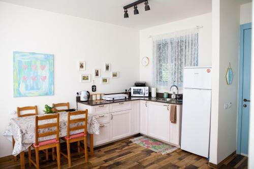 Lodge Olive - Israeli Zimmer