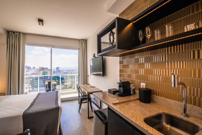 Apartamentos 360 Su�tes S�