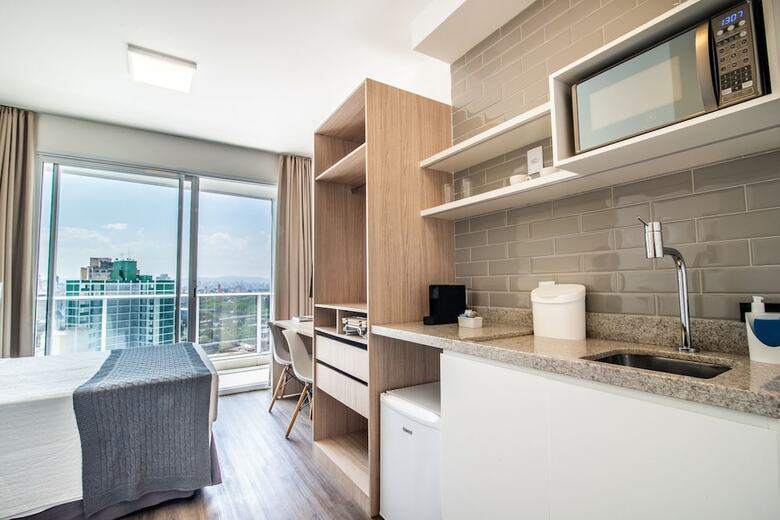 Apartamentos 360 Su�tes S�