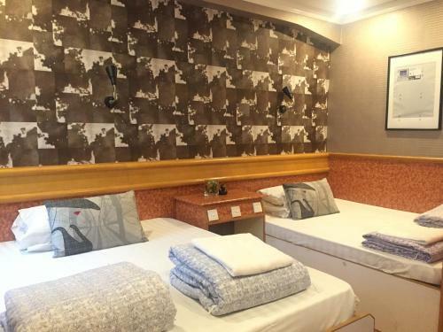 Hostal New Garden Hostel