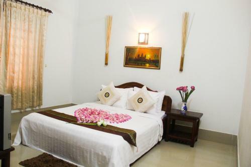 Hostal Tropical Breeze Guesthouse