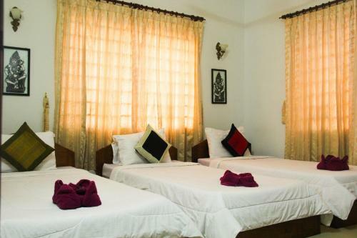 Hostal Tropical Breeze Guesthouse