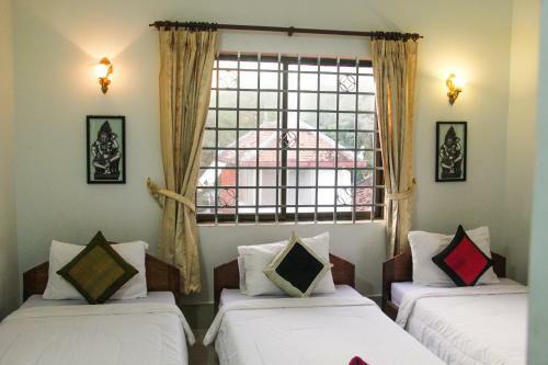 Hostal Tropical Breeze Guesthouse