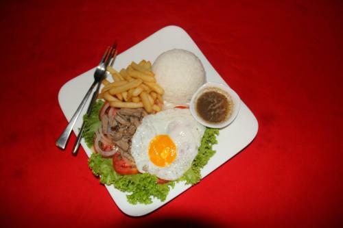 Hostal Tropical Breeze Guesthouse