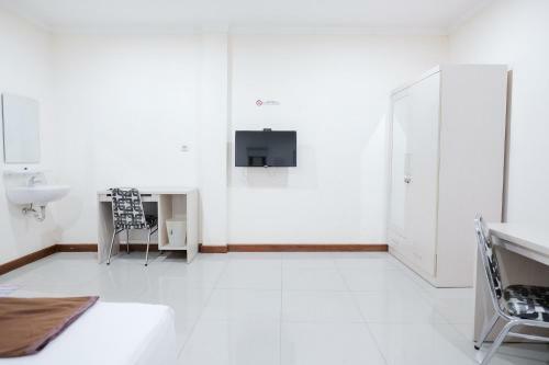 Hotel Wisma Delapan Redpartner