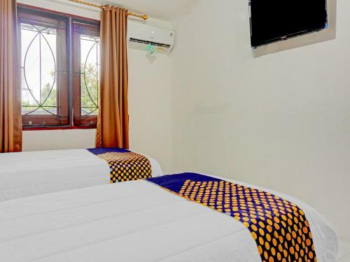 Hotel Spot On 90295 Simprug Residence