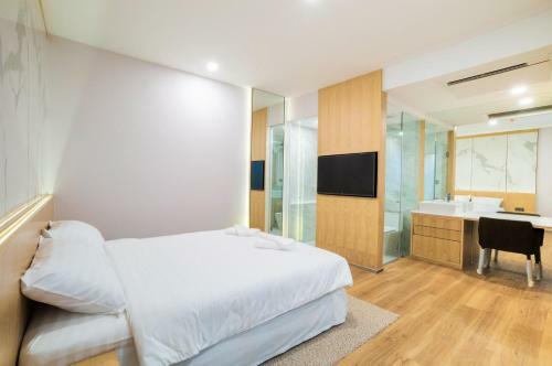 Artino Hotel - Sha Extra Plus