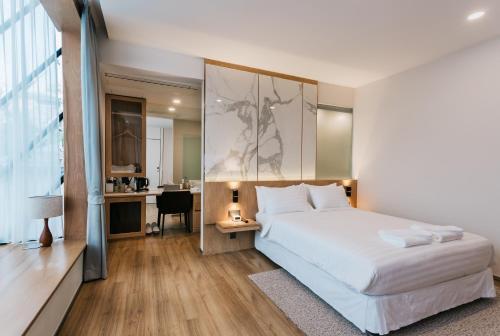 Artino Hotel - Sha Extra Plus