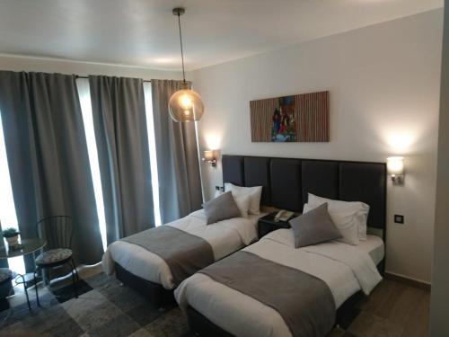 Red Rose Hotel And Suites
