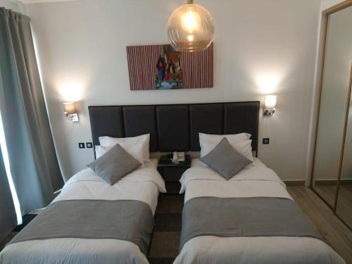 Red Rose Hotel And Suites