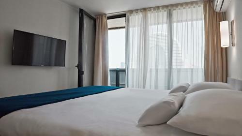 Orbi City Aparthotel