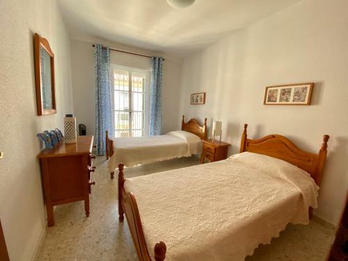 Chipiona/casa Adosada/c�ntrico+playa/5plazas/garaje/
