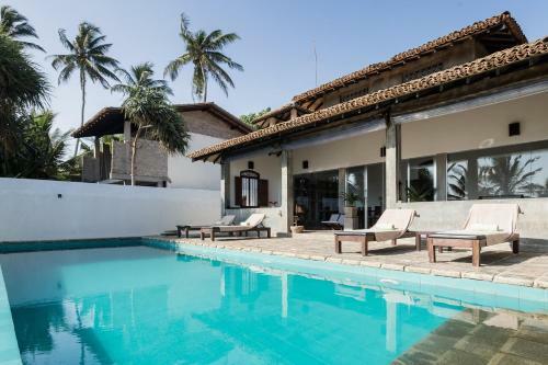 Green Parrot Beachvilla - Private Pool - 6 Pers