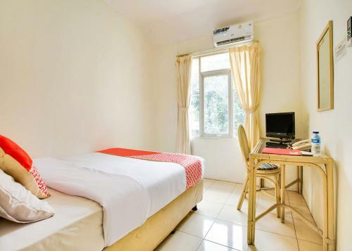 Oyo 2554 Hotel Arimbi Lama Dewi Sartika