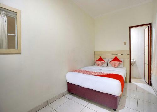 Oyo 2554 Hotel Arimbi Lama Dewi Sartika