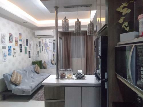 Emerald Tower Apartemen By Arra