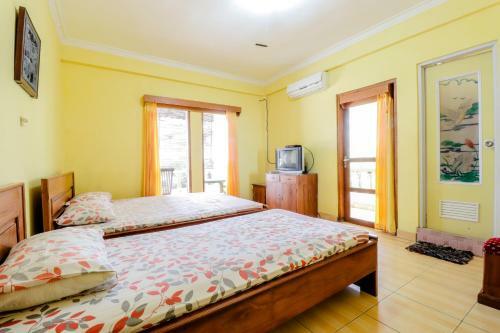 Adinda Beach Hotel And Villa