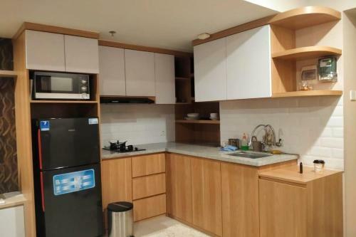 Apartemen Grand Kamala Lagoon By Icha Property