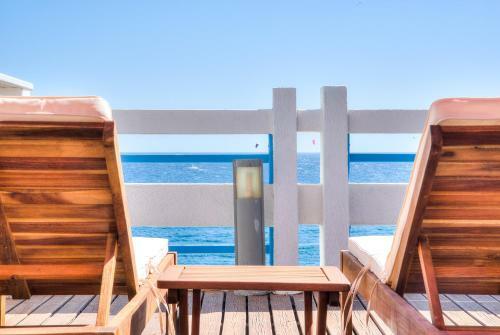 House Touching The Sea