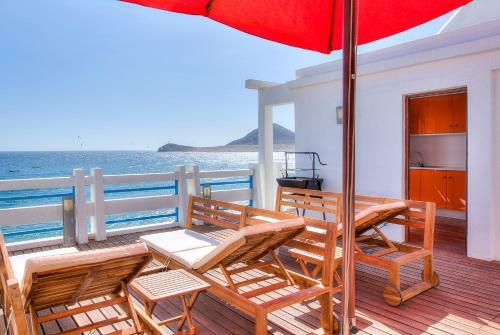 House Touching The Sea