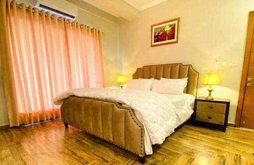 Holidazzle Serviced Apartments Bahria Town