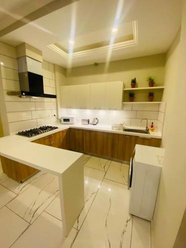 Holidazzle Serviced Apartments Bahria Town