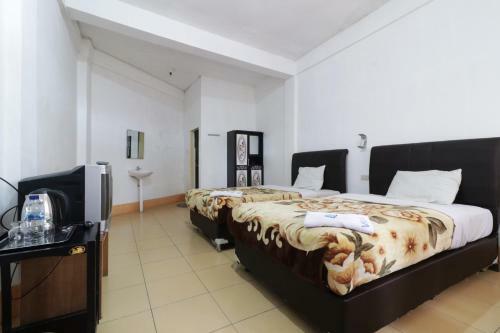 Hostal Villa Keluarga Bre Batunanggar
