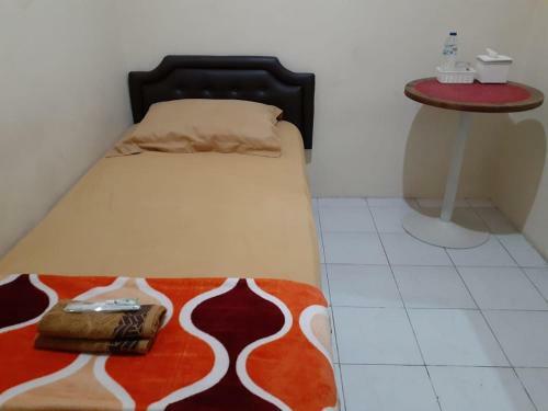 Hotel Kost Carmelia Syariah Baranangsiang Bogor