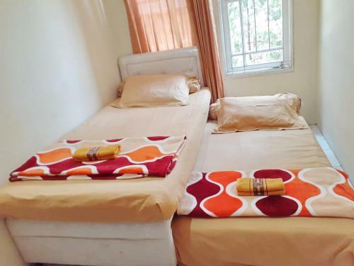 Hotel Kost Carmelia Syariah Baranangsiang Bogor