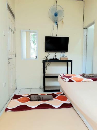 Hotel Kost Carmelia Syariah Baranangsiang Bogor
